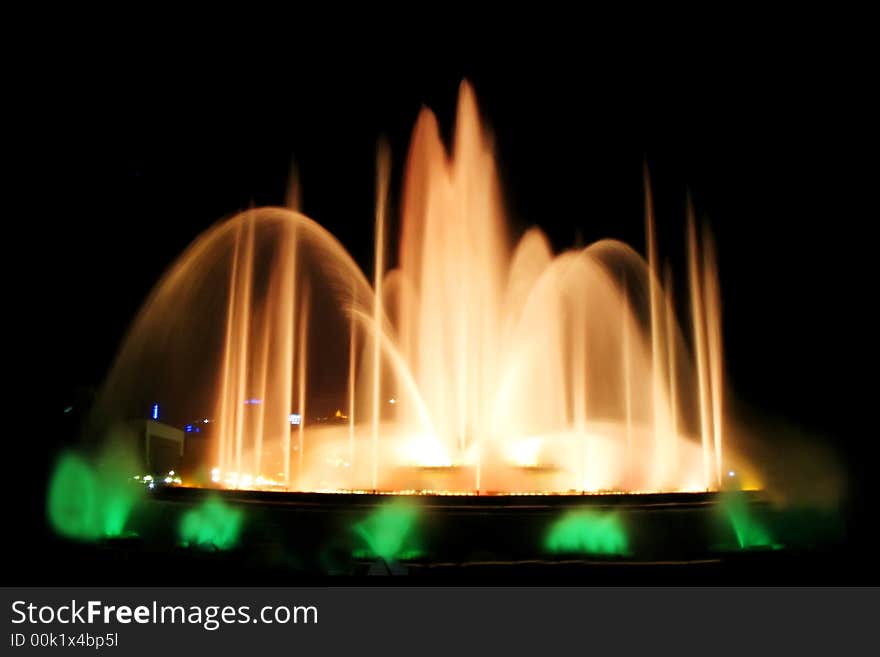 Montjuic magic fountain. A lights,colors and music spectacle at night, displayed in magic fountains situated in Barcelona (Spain)