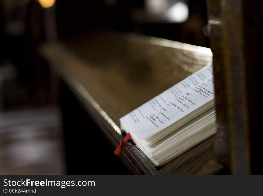 Praying book in a church.