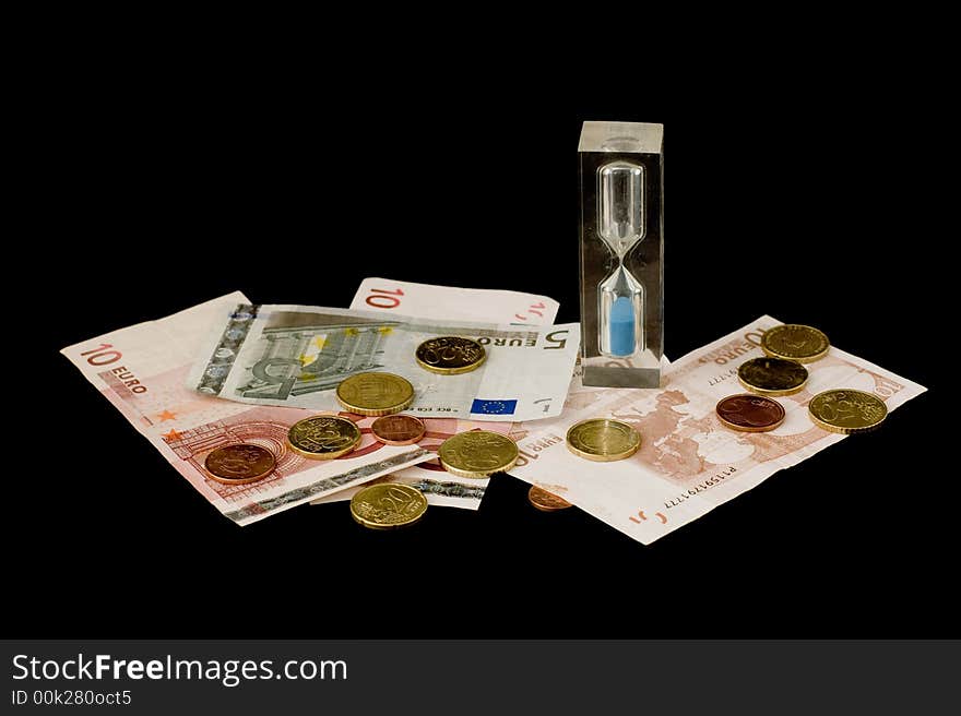 Dollar and hour glass isolated over black background. Dollar and hour glass isolated over black background