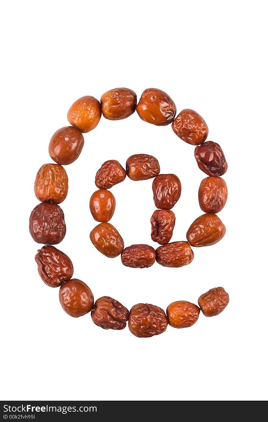 Email symbol made from Jjujube fruit (Chinese dates) isolated on white with a clipping path. Email symbol made from Jjujube fruit (Chinese dates) isolated on white with a clipping path