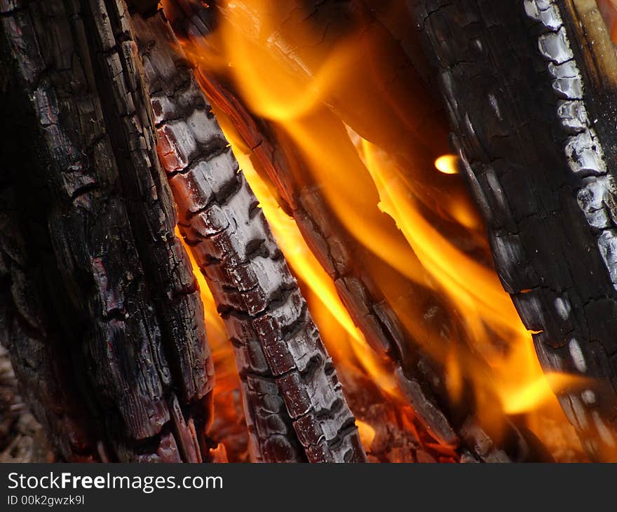 Black and silver embers. Super hot. Soft orange flame. Black and silver embers. Super hot. Soft orange flame.