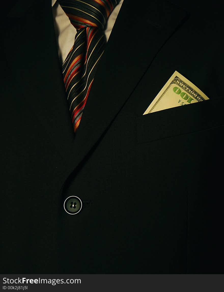 Businessman suit with 100 us dollars