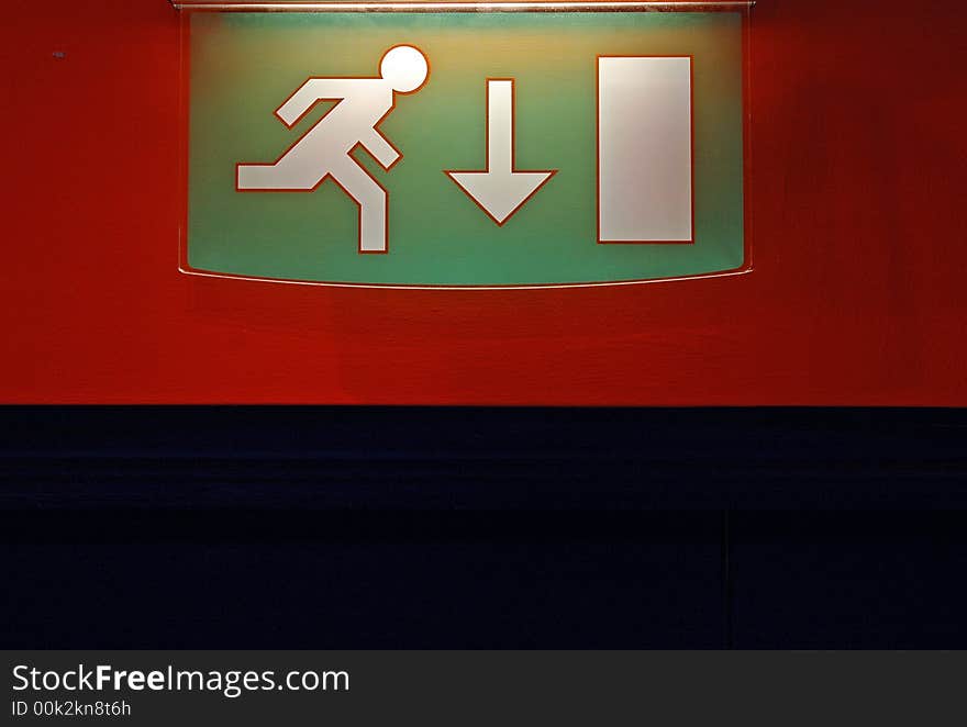 Emergency Exit sign mounted onto wall