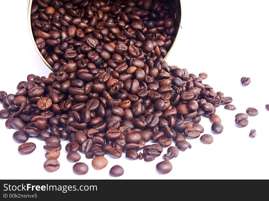 Coffee beans over white background.