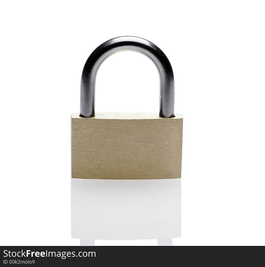 Closed Brass Metal Padlock On A White Background With Reflection. Closed Brass Metal Padlock On A White Background With Reflection