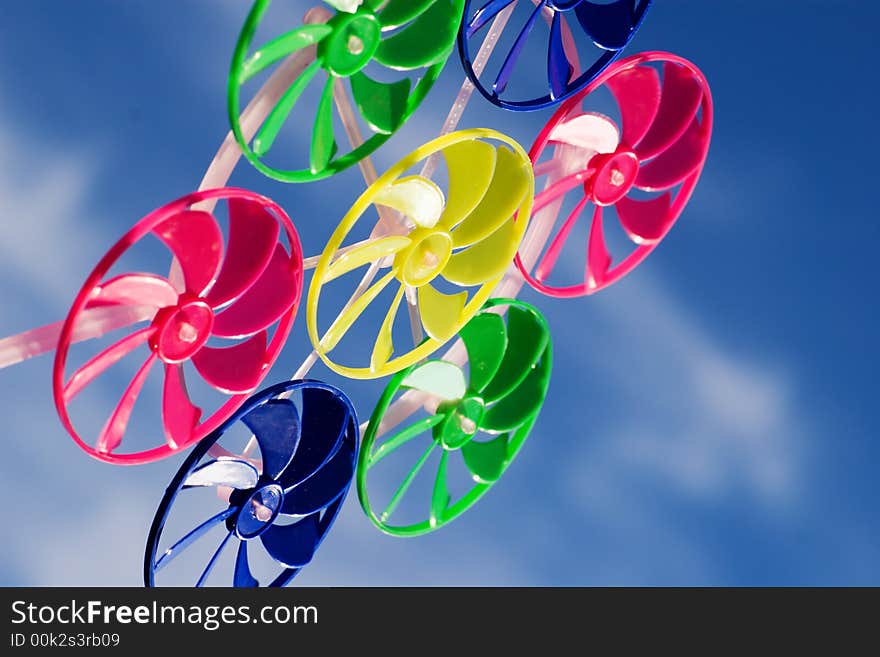 Spinner toy under blue skies. Spinner toy under blue skies