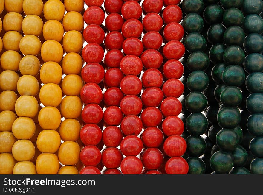 Close up colourful painted wooden necklace at vending. Close up colourful painted wooden necklace at vending.