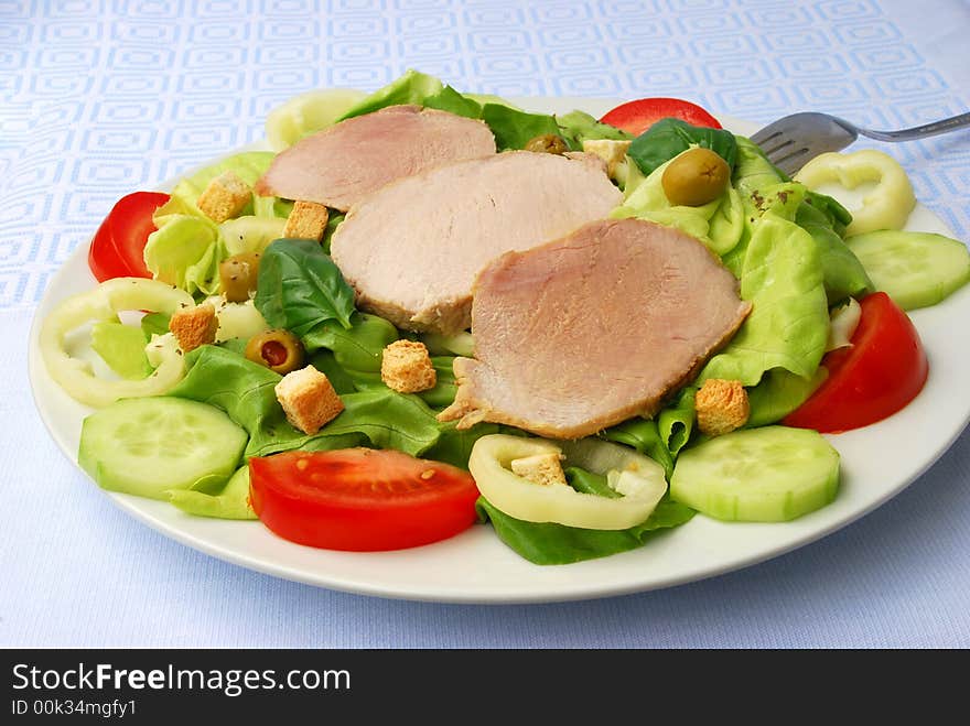 Tomato-lettuce salad.a  close up shot.