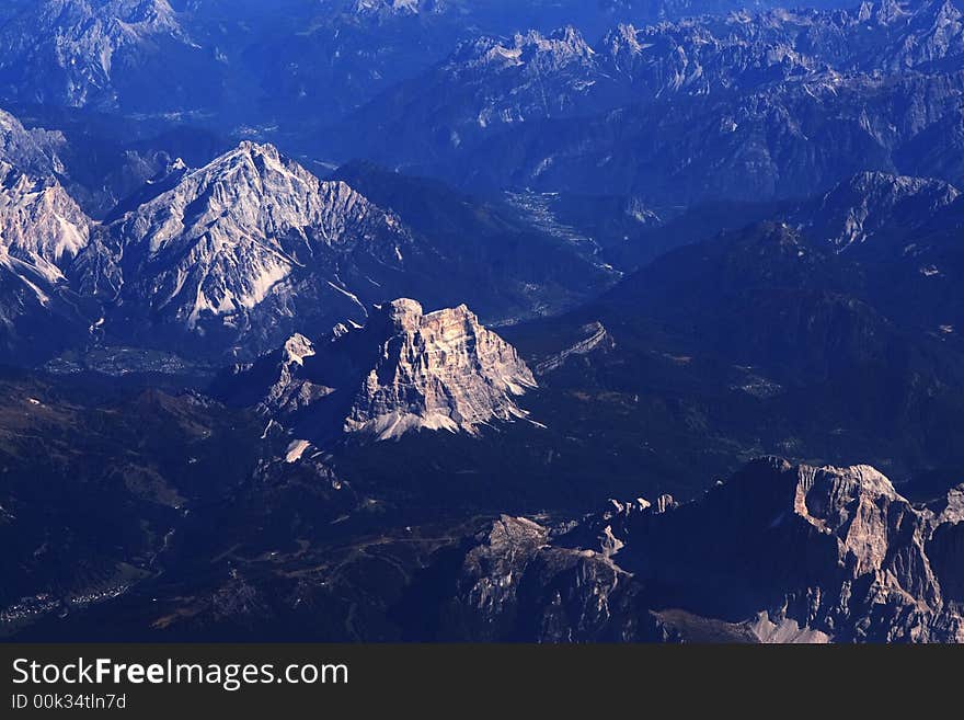 Aerial view of Alps. Overall picture has a (natural for this subject) blue shift. Aerial view of Alps. Overall picture has a (natural for this subject) blue shift.