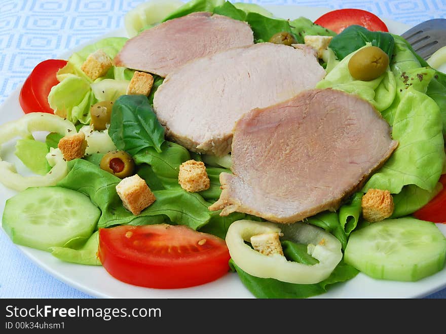 Tomato-lettuce salad.a close up shot. Tomato-lettuce salad.a close up shot.