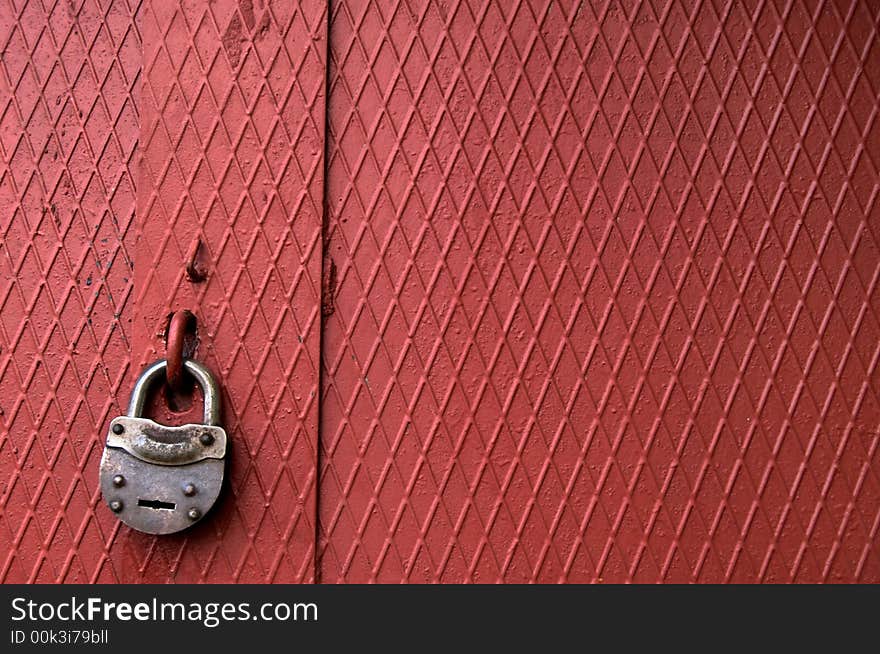 An image of metallic door with  lock. An image of metallic door with  lock
