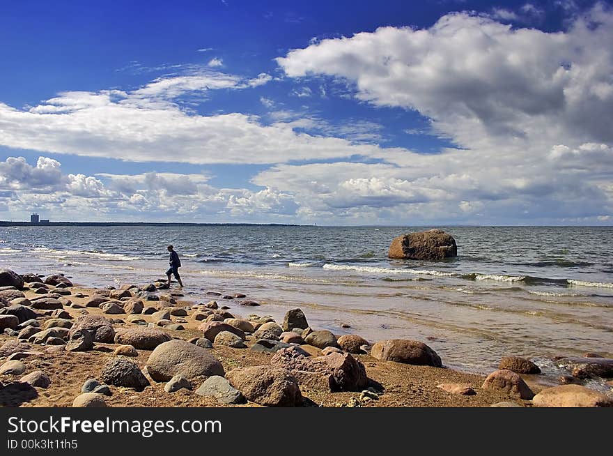 Landscape with blue sky, clouds, stones and sea. Landscape with blue sky, clouds, stones and sea