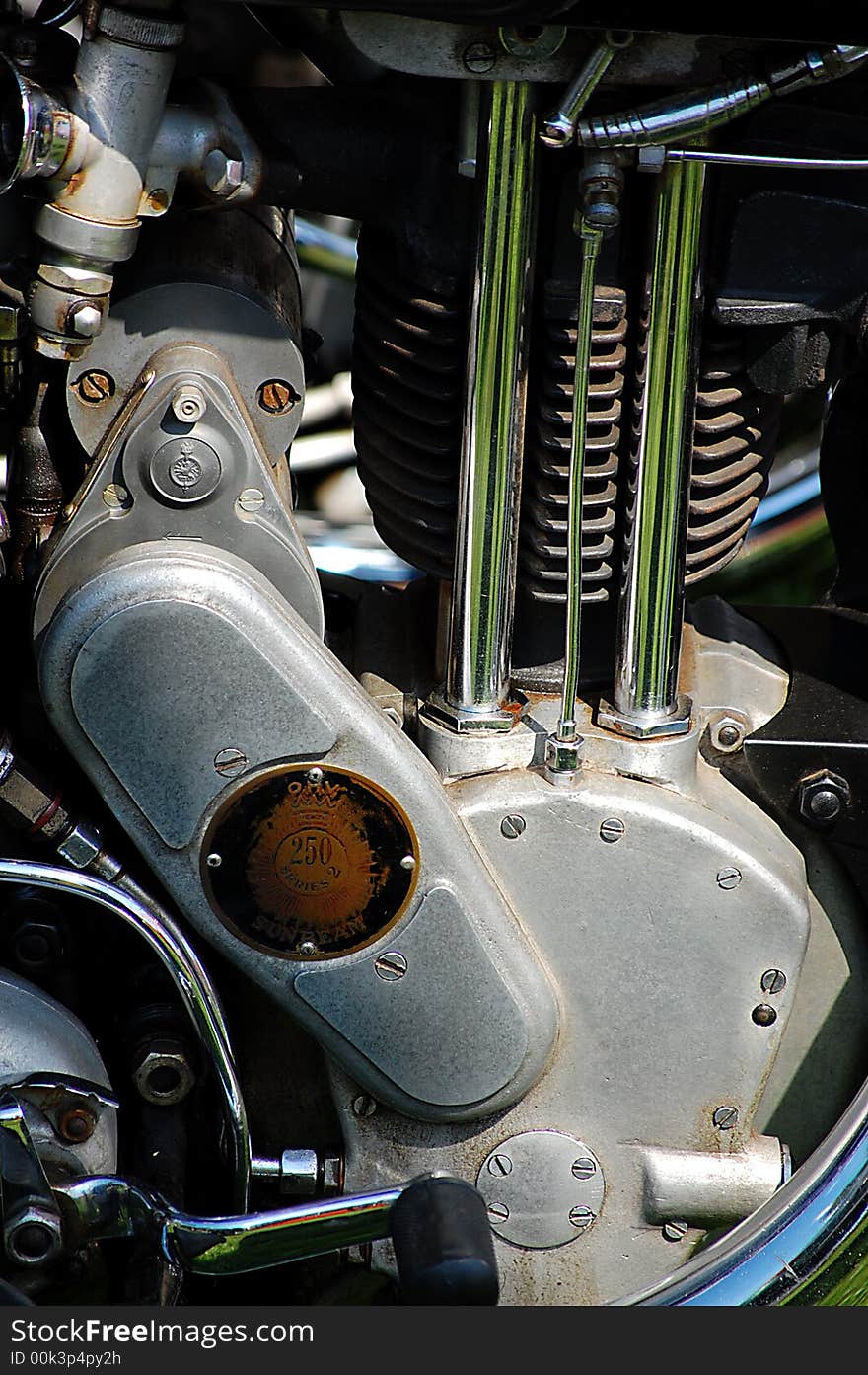 Close up ohc sunbeam engine highly polished push rod tubes high quality chrome on exhaust