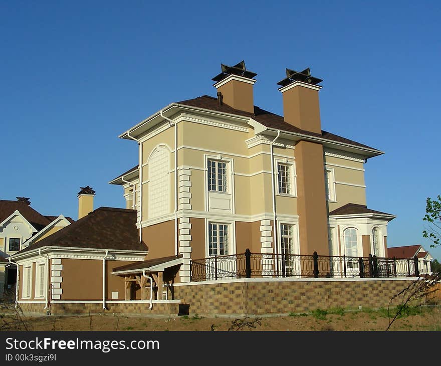 Newly erected building in village at suburb of city. Newly erected building in village at suburb of city