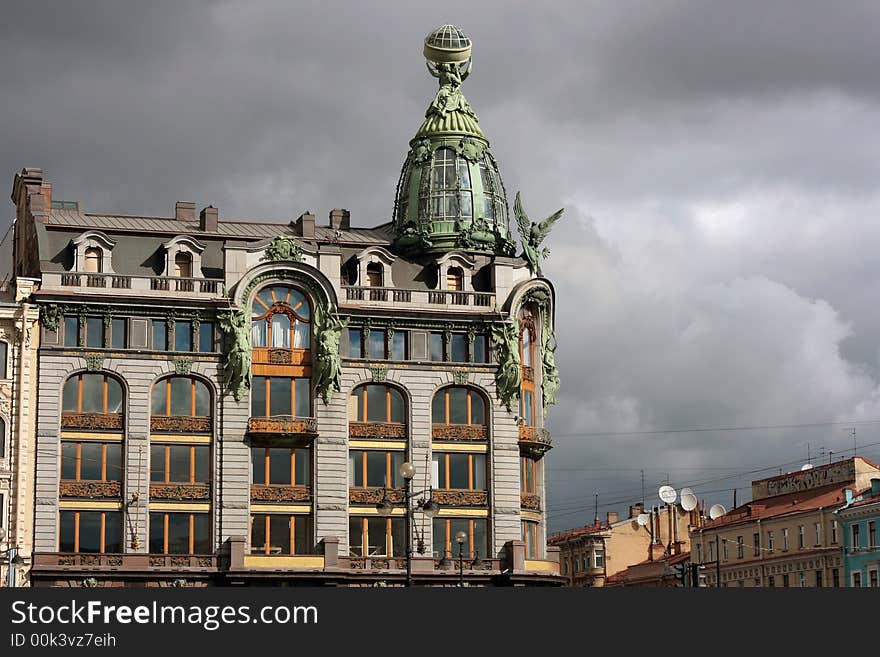 Antique house is photographed on a grey sky