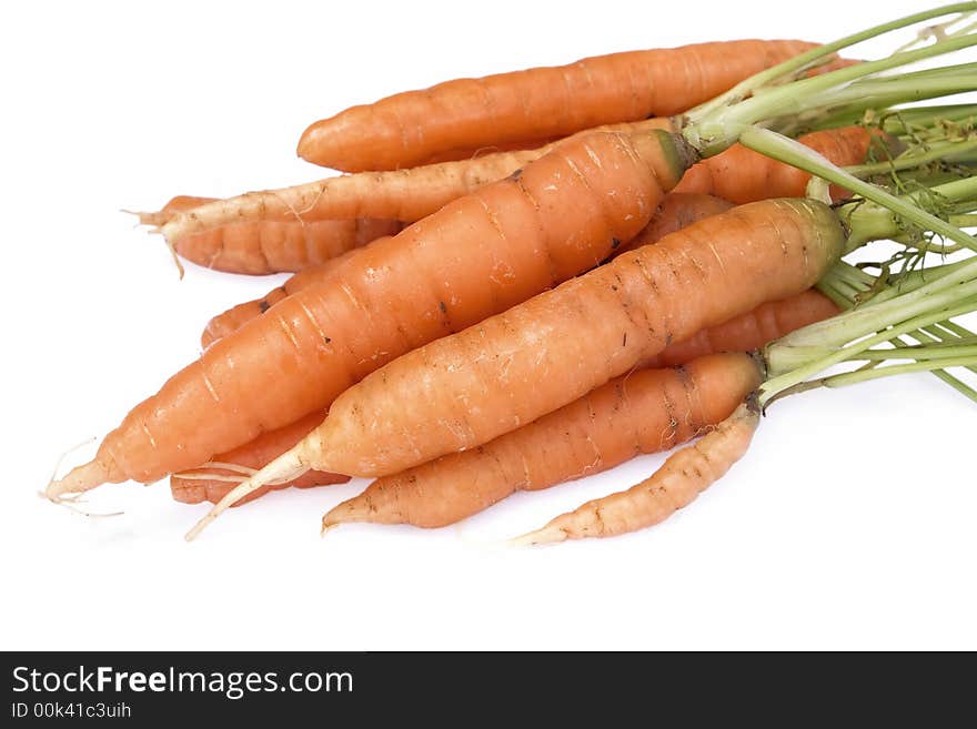 Fresh carrots isolated on white background.