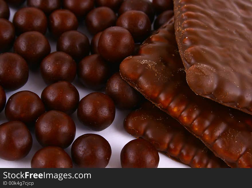 Chocolate sweets against white