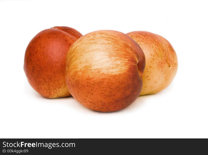 Close up of nectarines isolated on a white background. Close up of nectarines isolated on a white background