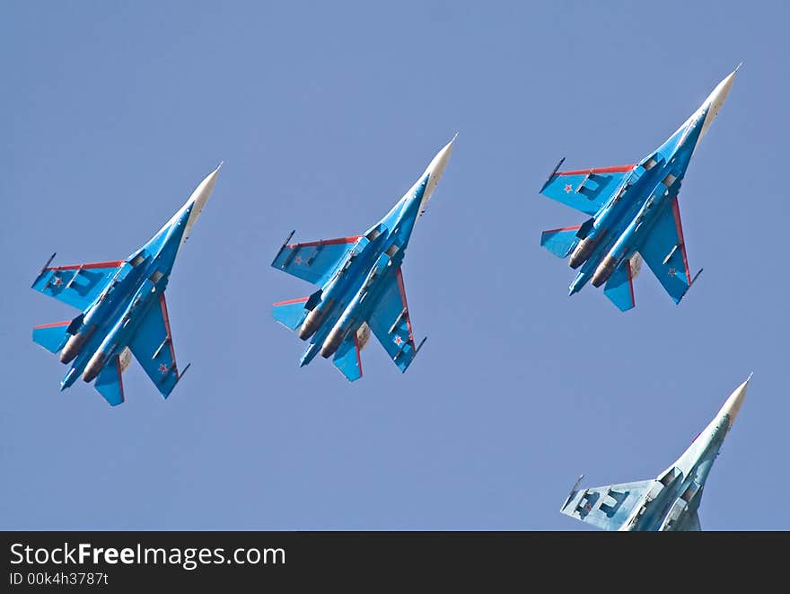 SU-27 interceptors. Flying group Russian Knights. Fly-past at 95th anniversary of Russian Air Force. 11 August 2007. SU-27 interceptors. Flying group Russian Knights. Fly-past at 95th anniversary of Russian Air Force. 11 August 2007