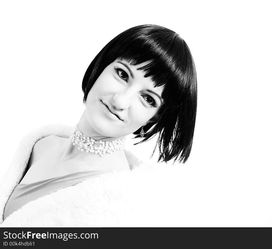 Black & white portrait of a woman leaning backwards into the photo looking past the camara