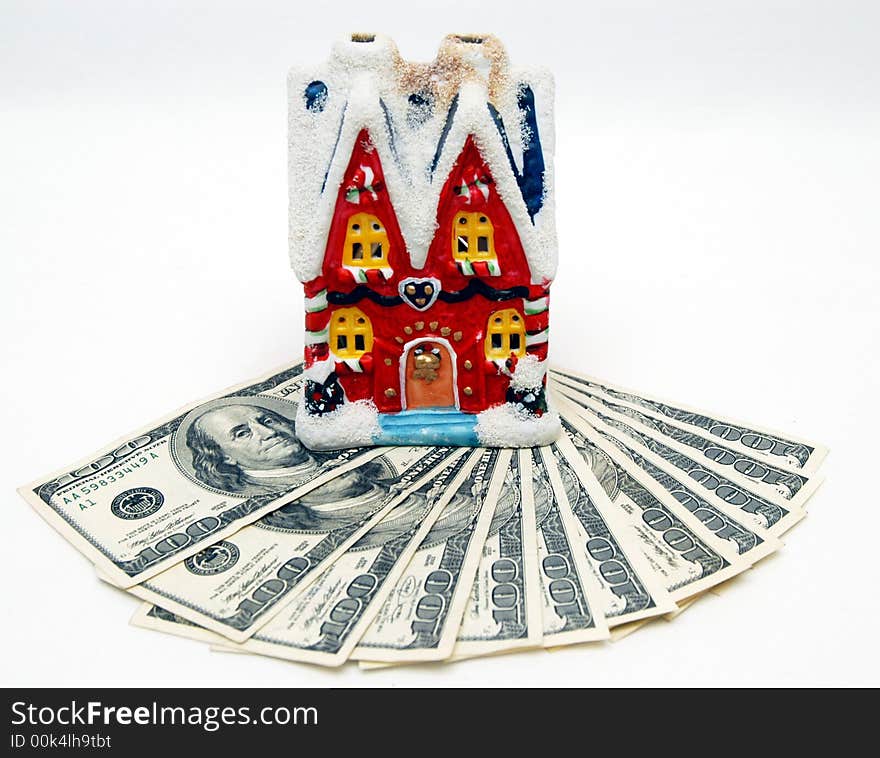 two-story house with 100 dollars bills background. two-story house with 100 dollars bills background