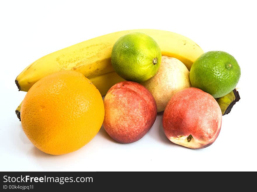 Bananas, peaches, lemons all isolated over white background with nice shadow. Bananas, peaches, lemons all isolated over white background with nice shadow