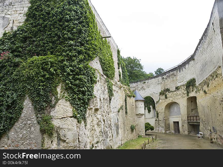 At the bottom of the deep rocky moat of chateau (castle) Brézé, Loire Valley, France. At the bottom of the deep rocky moat of chateau (castle) Brézé, Loire Valley, France