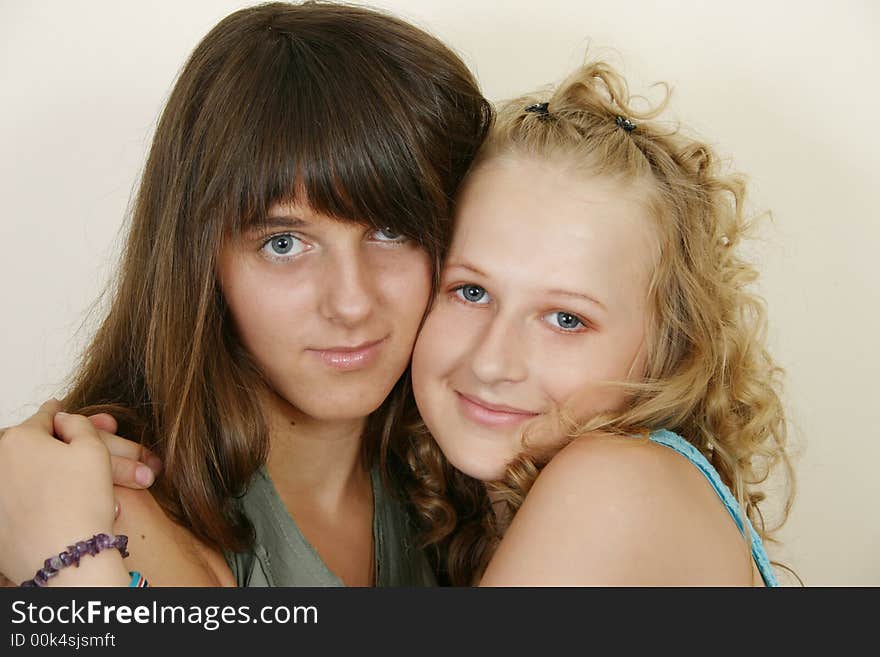 Portrait image of two young girls smiling. Portrait image of two young girls smiling