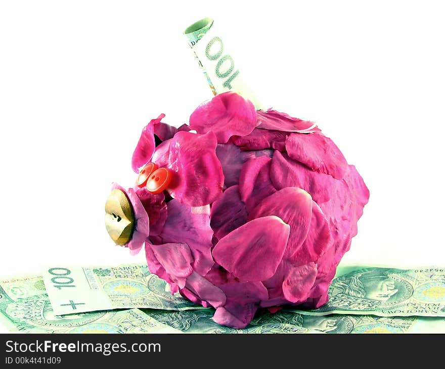 Conceptual abstract: pink pig of money-box on white background