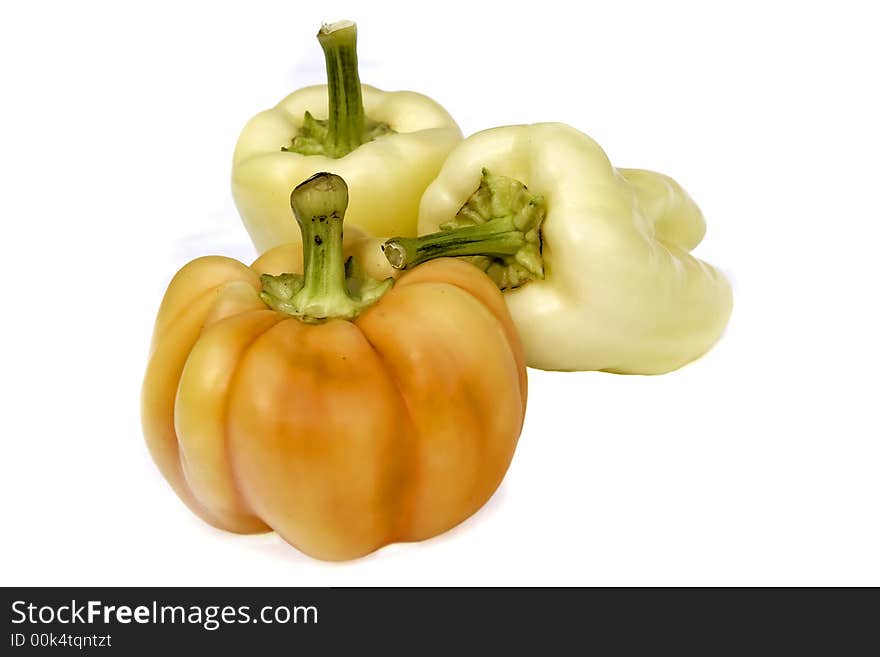 Three peppers isolated on white background.