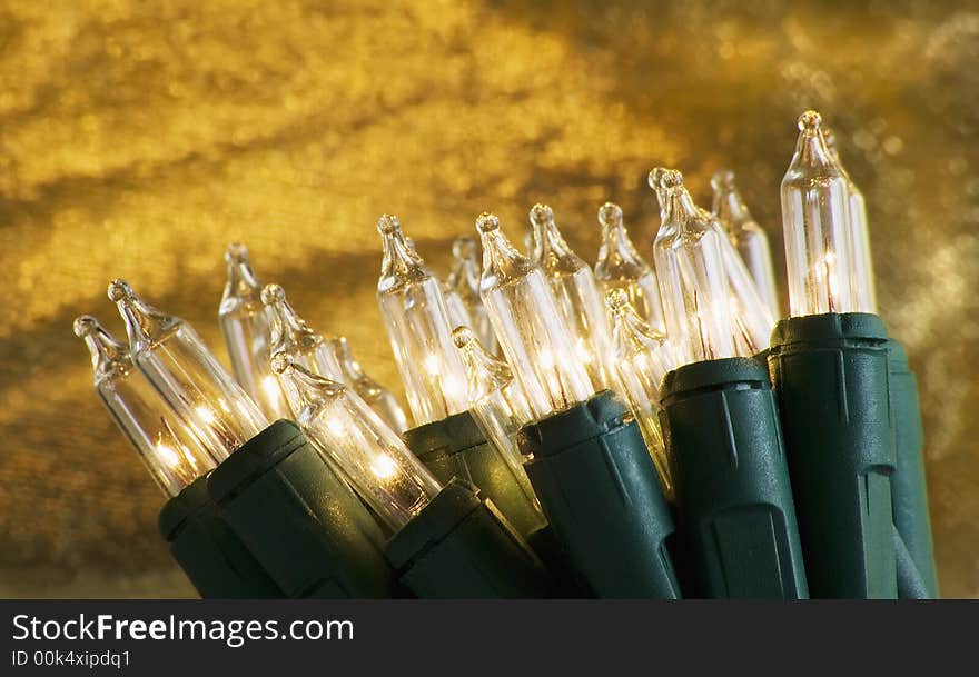 Small illuminated elecrtical white holiday light bulbs. Small illuminated elecrtical white holiday light bulbs.