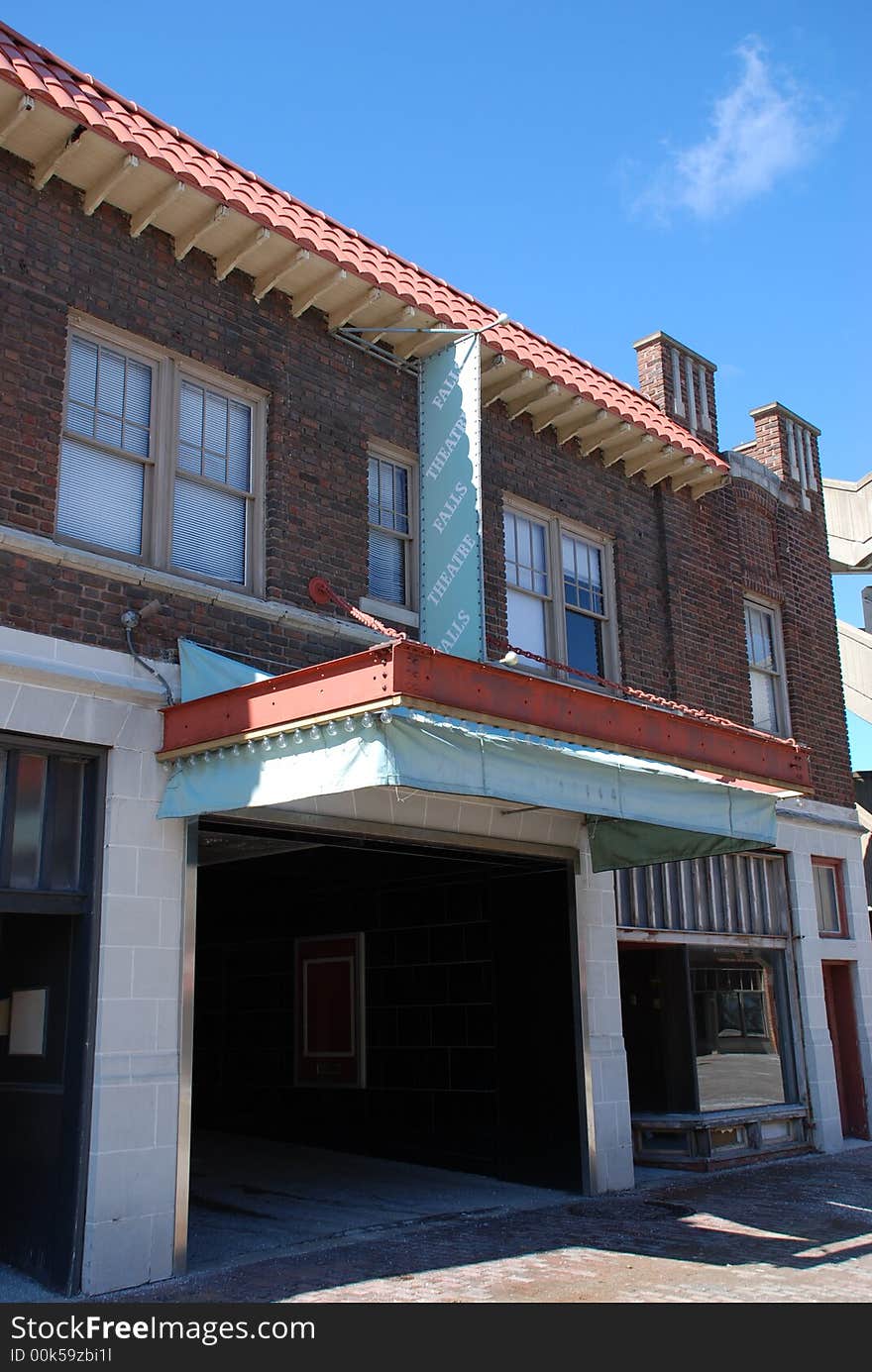 A red brick building displaying a lot of detail. A red brick building displaying a lot of detail