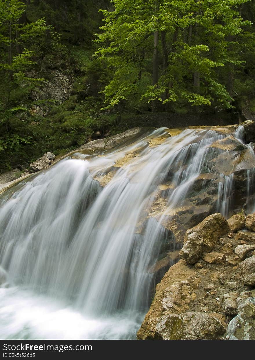 Waterfall On Mountain River