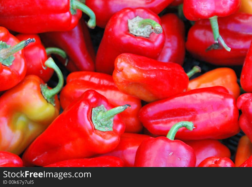 Red hot peppers on display at a local market.