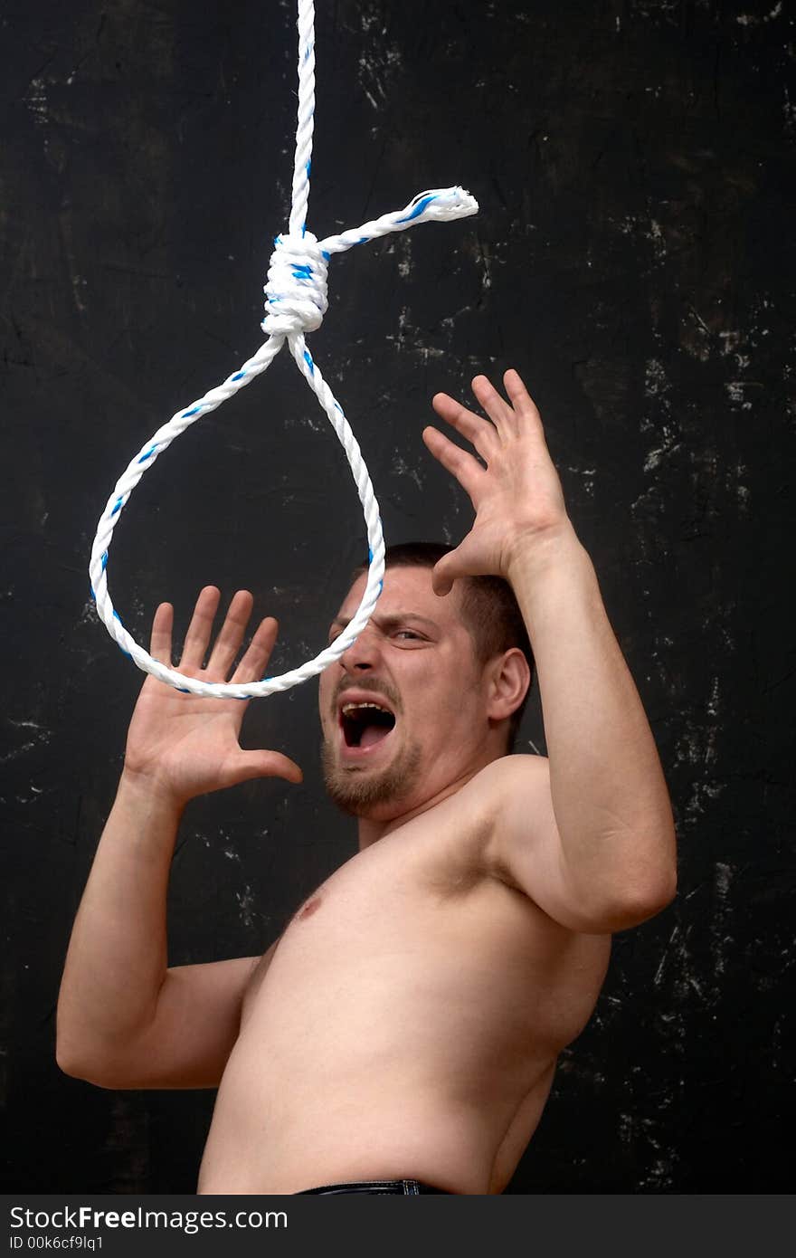 A man shouting to a rope noose. A man shouting to a rope noose