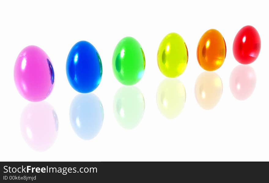 Brightly colored Easter eggs on a reflective surface. Brightly colored Easter eggs on a reflective surface.