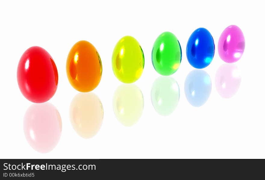 Brightly colored Easter eggs on a reflective surface. Brightly colored Easter eggs on a reflective surface.