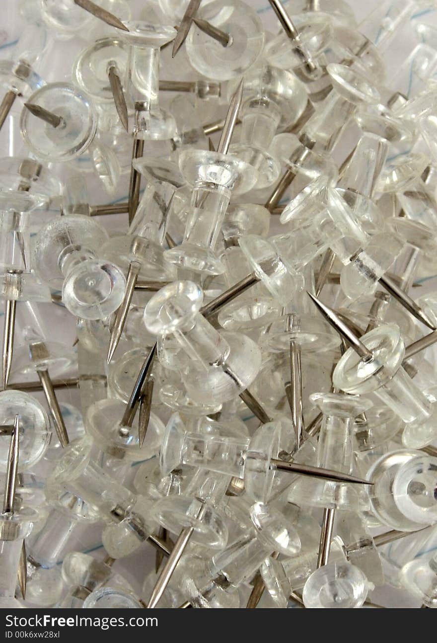 A full frame image of thumbtacks