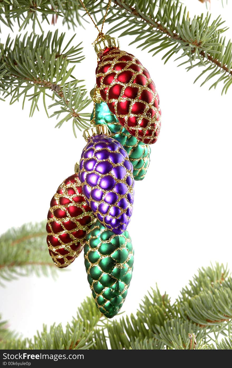 Glass Christmas decorations shaped like pine cones. Glass Christmas decorations shaped like pine cones.