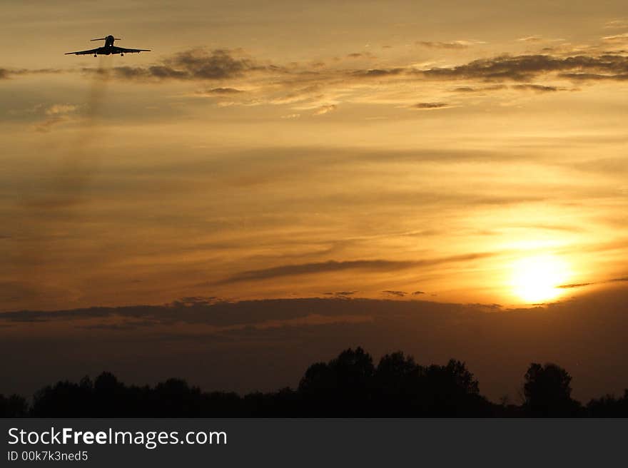 Airplane and sunset 1