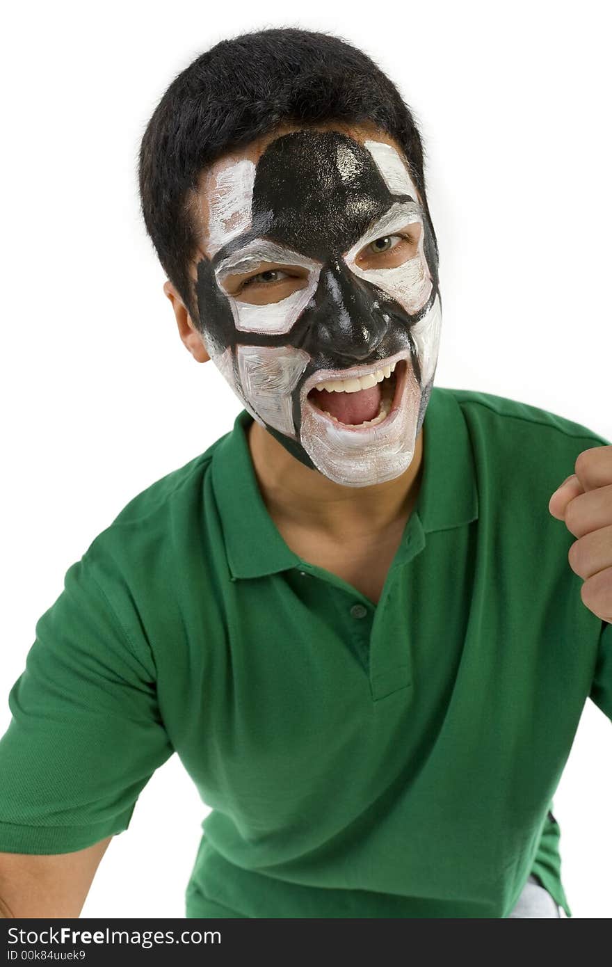 Football's fan with painted ball on face. He's on white background. Front view. He's looking at camera. Football's fan with painted ball on face. He's on white background. Front view. He's looking at camera.