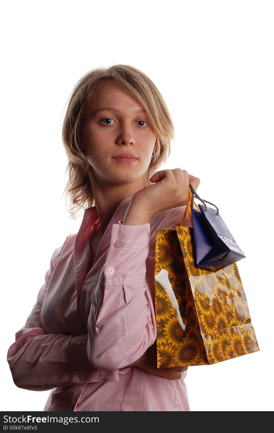 Women with shopping bags on white