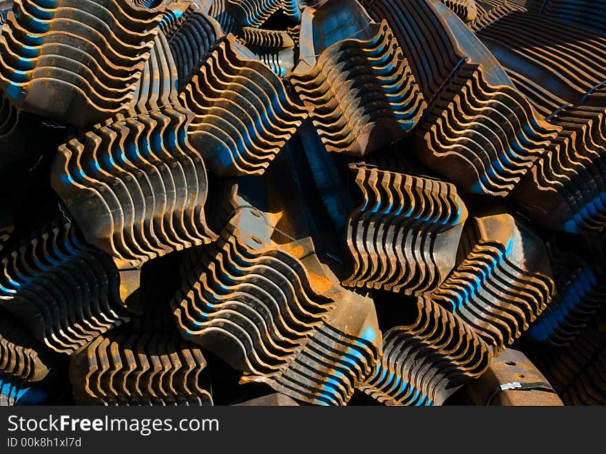 A stock pile of roadside barriers. A stock pile of roadside barriers