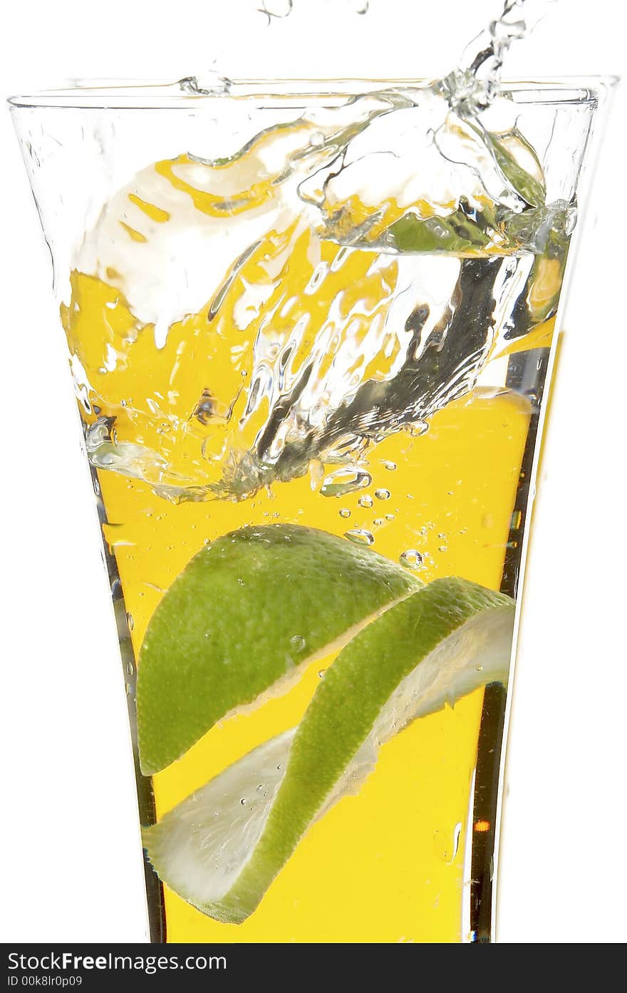 Glass with juice and lime