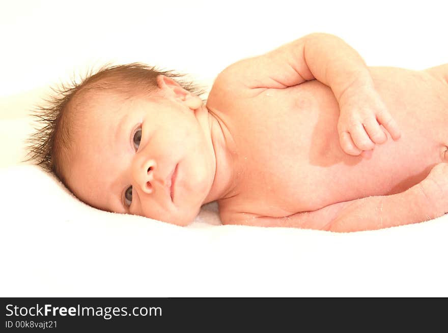 Little ten day old baby boy resting and in the meanwhile being a lovely sweet photomodel. Little ten day old baby boy resting and in the meanwhile being a lovely sweet photomodel