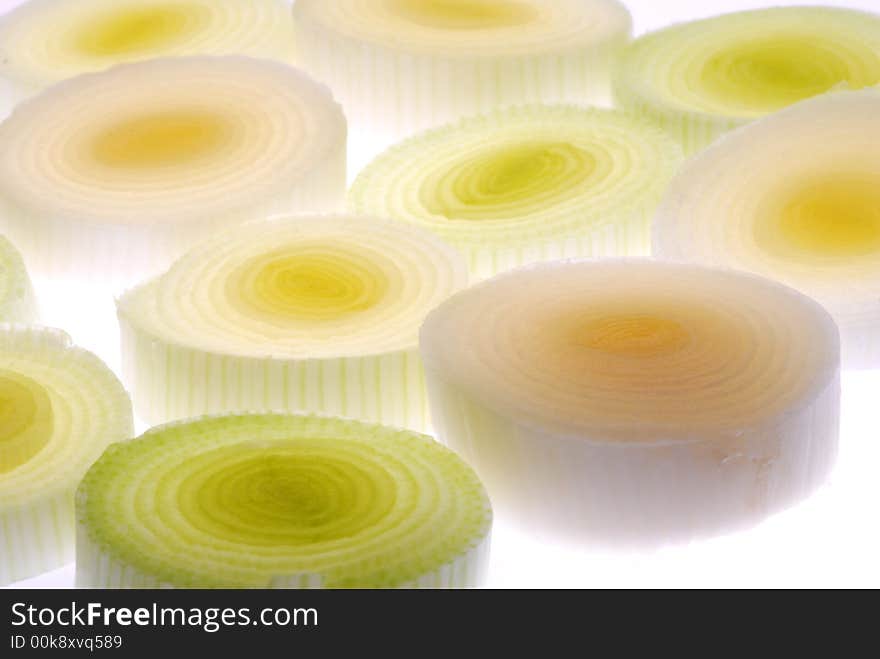 Slices of leek on light box