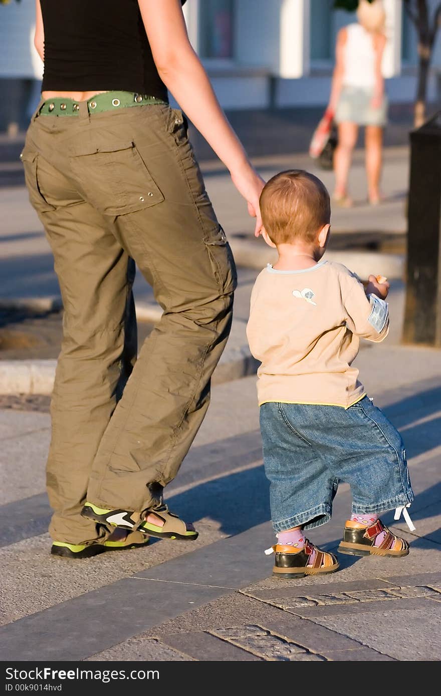 Mama and son go for a walk. Mama and son go for a walk