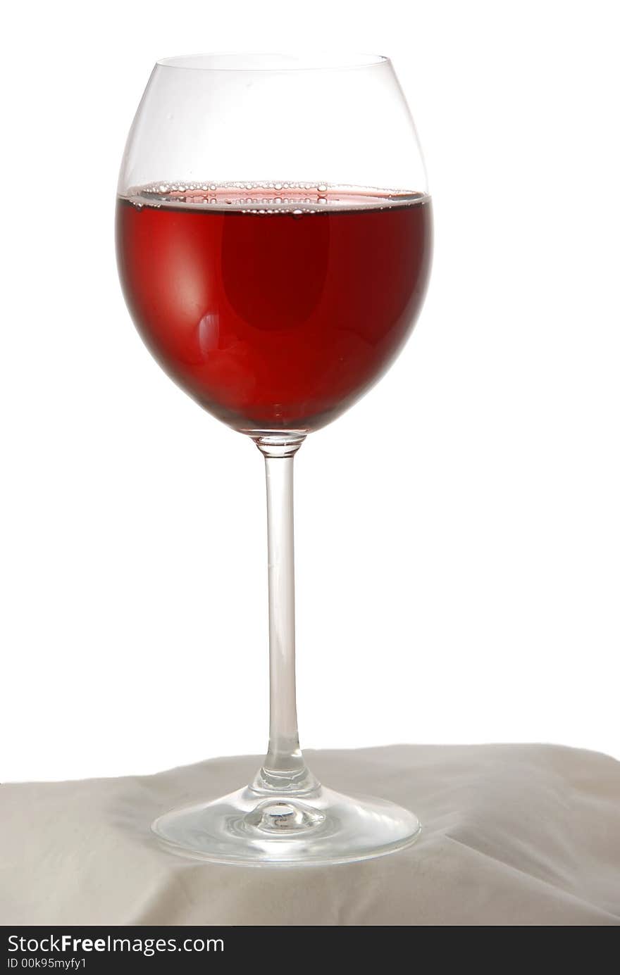 Red wine on white background