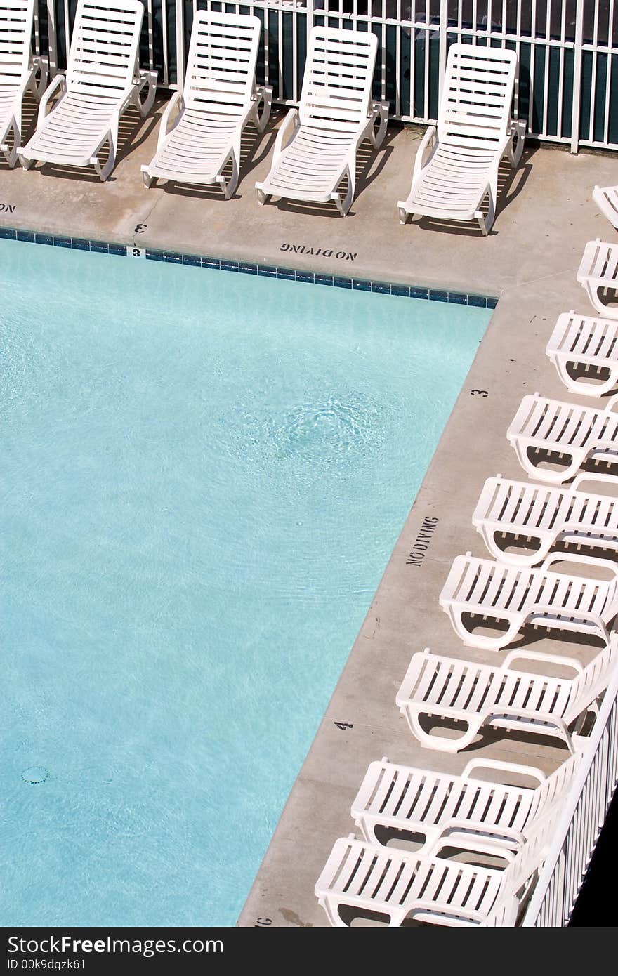 Chairs At Poolside