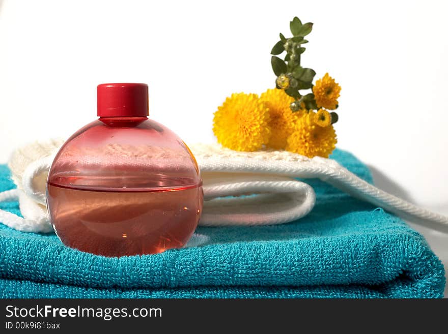 An image of oil and sponge in bathroom. An image of oil and sponge in bathroom